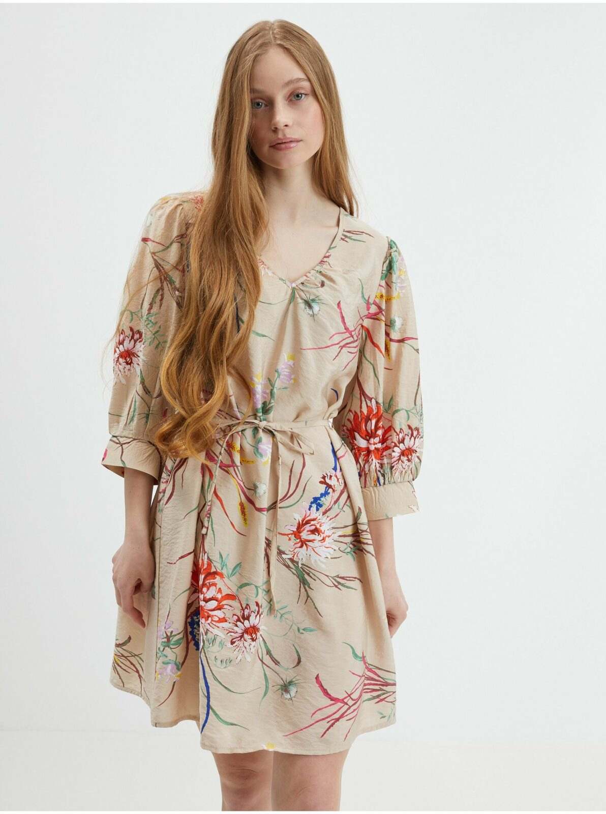Béžové dámské šaty s květinovým vzorem