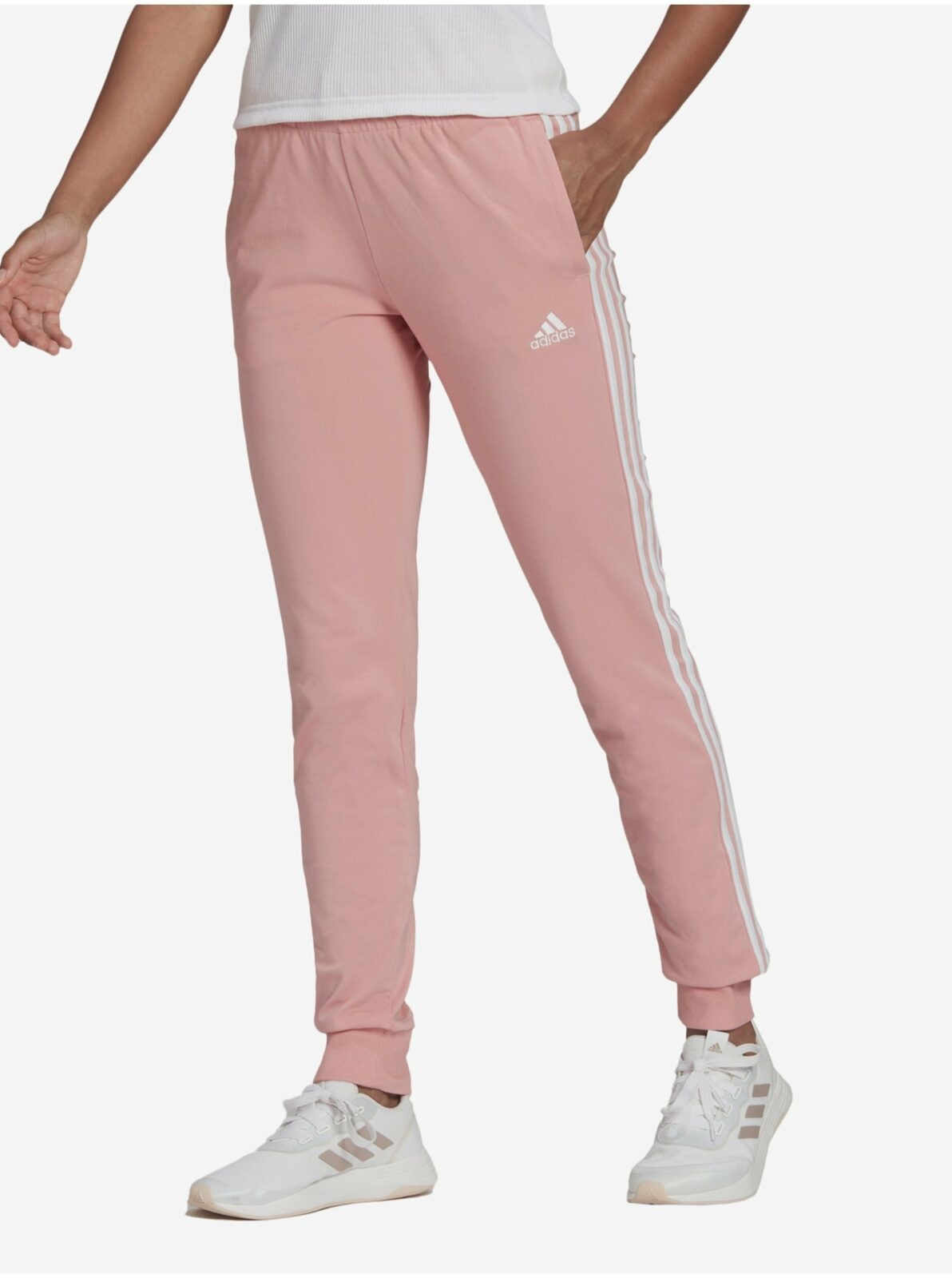Světle růžové dámské tepláky adidas