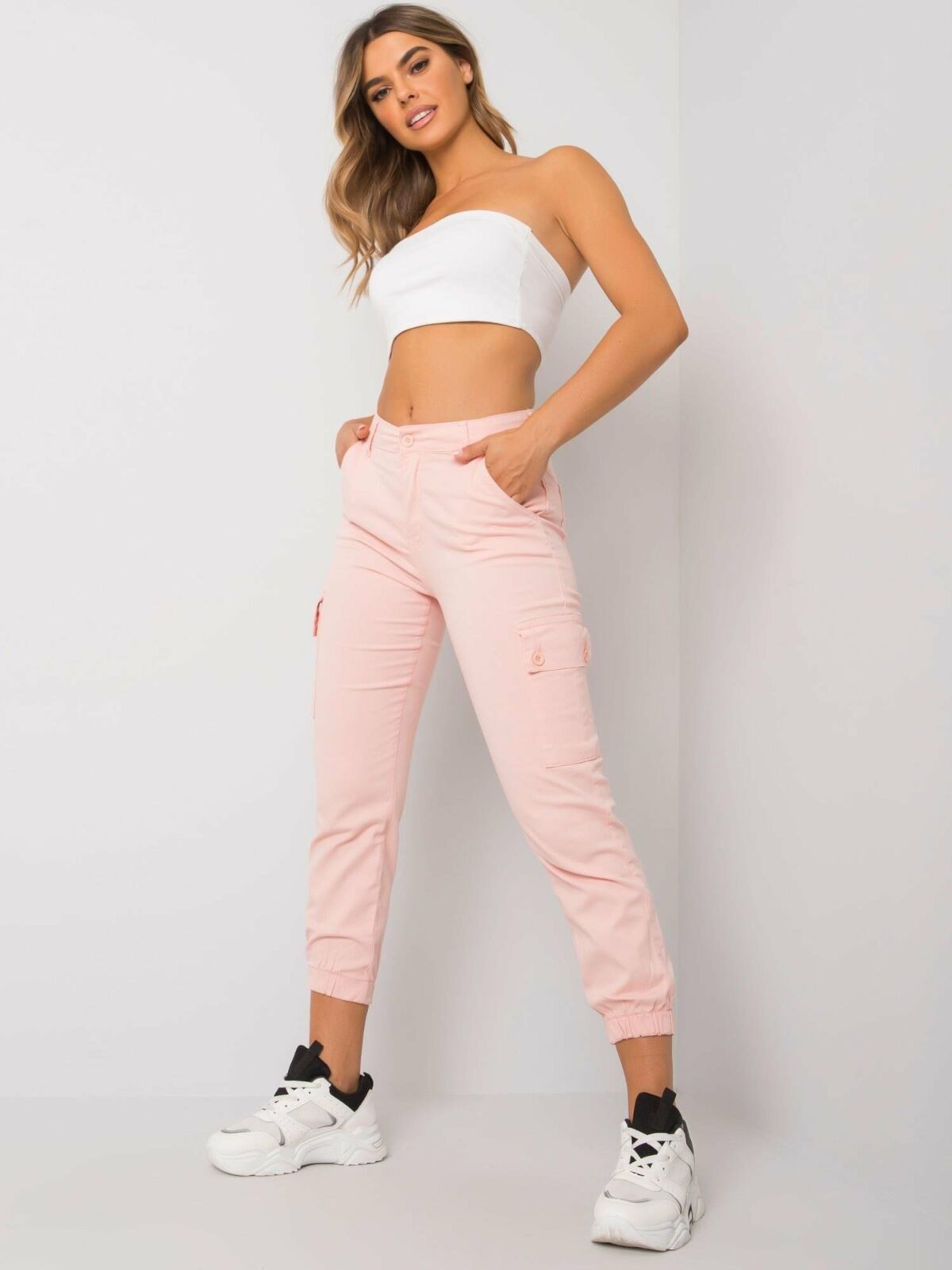 Světle růžové látkové kalhoty
