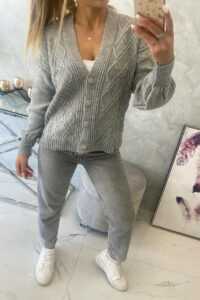 Buttoned sweater with a decorative weave
